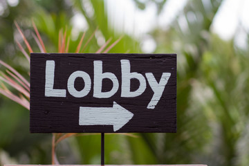 Lobby sign. on the old wood