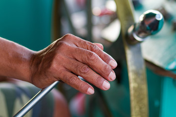 Men are controlling a passenger boat - selective focus
