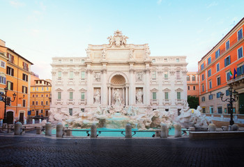 Fototapeta na wymiar restored Fountain di Trevi in Rome in soft sunrise light, Italy, retro toned