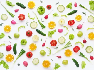 Poster Im Rahmen Vegetables and fruits on a white background. Pattern of vegetables and fruits. Food background. Collage of food. Top view.  Composition of pears, green peppers, cucumbers, green radish, tomatoes, gree © Tatiana Morozova