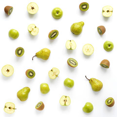 Fruits on a white background. Pattern of  fruits. Food background. Collage of food. Top view.  Composition from pears, green apples, kiwi.