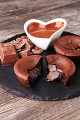 Delicious chocolate cakes on wooden background chocolate brownie