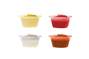 Plastic containers with sauces ketchup mustard dips on white background. Collection. © Yell Design