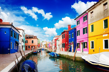 Naklejka na ściany i meble multicolored houses over canal with boats, street of Burano island, Venice, Italy, retro toned