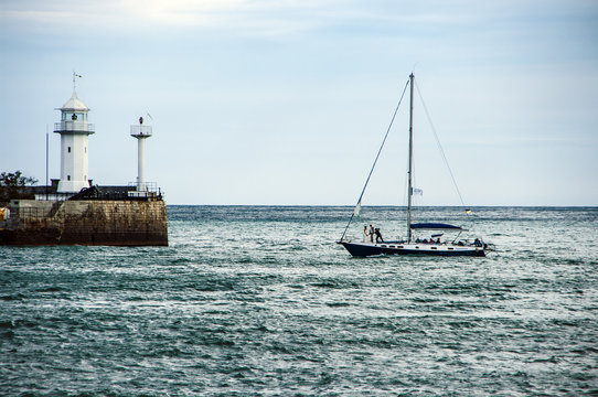 Fototapeta Sailing yacht in the sea bay