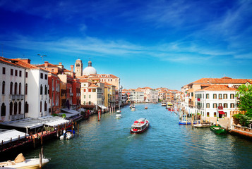 Fototapeta na wymiar cityscape of Venice - Grand canal with boats at sunny day, Venice, Italy, retro toned