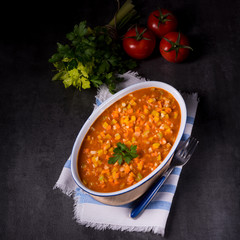 fish with vegetables in tomato sauce