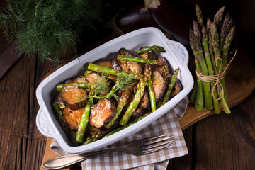 Baked eggplant with green asparagus