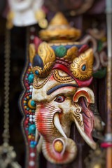 Fototapeta na wymiar Masks, dolls and souvenirs in street shop at Durbar Square in Kathmandu, Nepal.