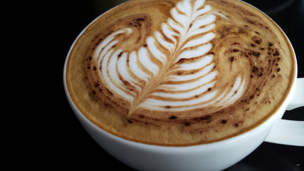 Cup of coffee with beautiful Latte art