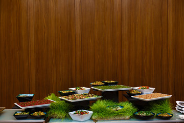 people group catering buffet food indoor in luxury restaurant with meat colorful fruits and vegetables