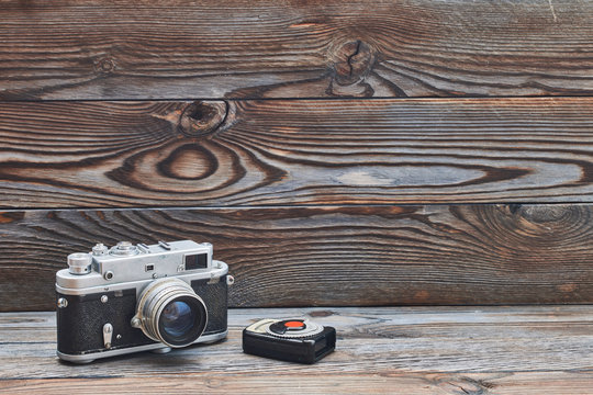 Vintage old retro 35mm rangefinder camera and light meter