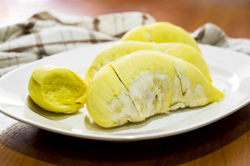 durian king of all fruits very fresh and yummy durian plate on the wood table.
