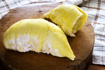 durian king of all fruits very fresh and yummy durian plate on the wood table.