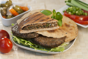Egyptian Hawawshi  with pita bread and salad