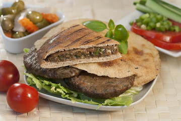 Egyptian Hawawshi  with pita bread and salad