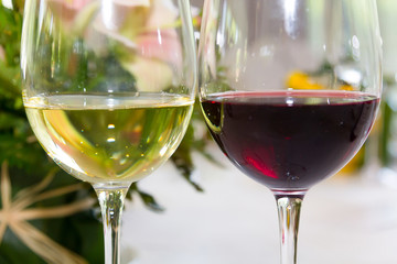 Crystal glasses with red and white wines