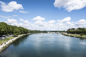 Fototapeta premium Pont d'Avignon, Rhone river, Palace of Popes - Palais des Papes - in Avignon, France, UNESCO World Heritage Site