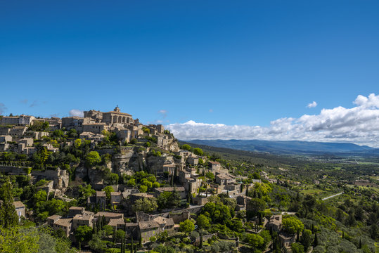 View on Gordes, a small typical town in Provence, France. Beautiful village, with view on roof and landscape