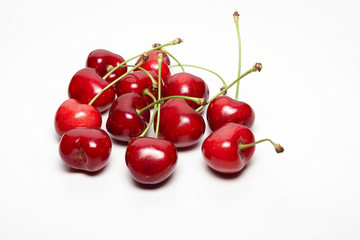 Fototapeta na wymiar dozen beautiful cherry and one rotten, shifted the focus