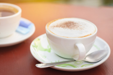 Coffee cup in coffee shop, energy charge on relax times