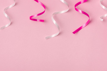 Delicate pink ribbons party background for celebrating