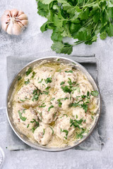 Meatballs with white sauce, top view