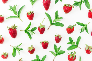 Fresh strawberry. Red strawberry. Strawberry and leaves on white background. Flat lay. Top view.