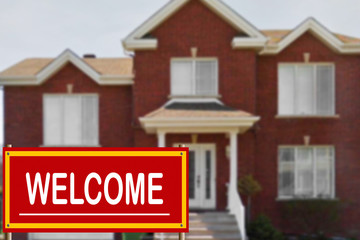 Cottage for sale and welcome sign