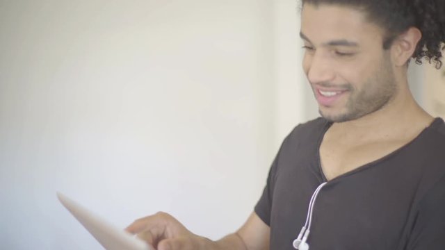 Young man using digital tablet