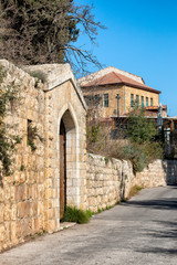 Fototapeta na wymiar Historic Gate at the Mishkenot Shaananim in Jerusalem