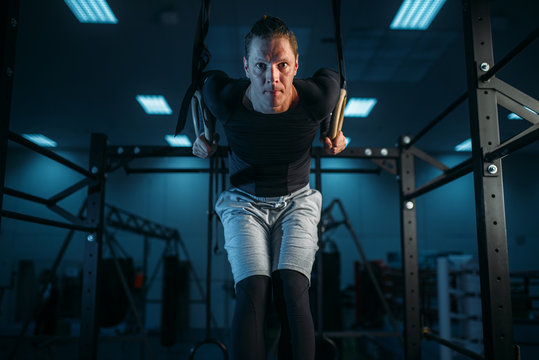 Athlete on training, exercise on gimnastic rings
