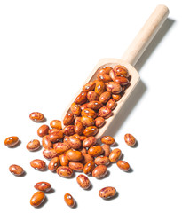 dried pinto beans isolated on the white background, (large depth of field, taken with tilt shift lens)