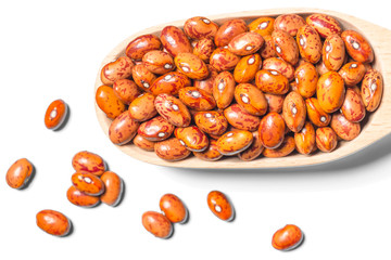 dried pinto beans isolated on the white background, top view