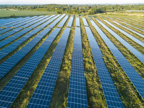 An aerial view of a solar farm set in the english countryside