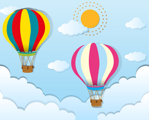 Fototapeta premium Two balloons flying in blue sky