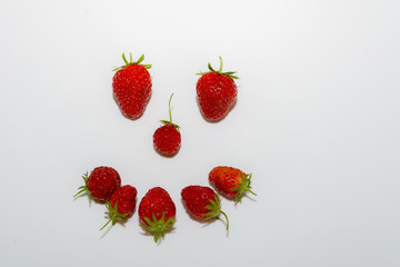 frische Erdbeeren als Gesicht das Lacht