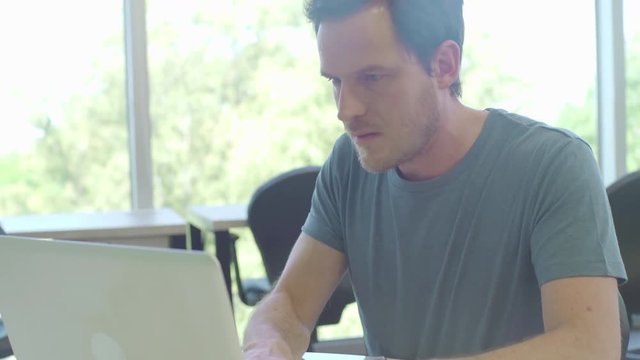 Man using laptop computer