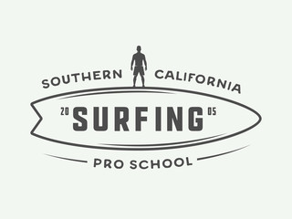 Vintage surfing logo, emblem, badge, label, mark. International surfing day card. Graphic art. Vector Illustration. Graphic Art.