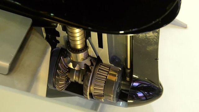 Detail of the propeller mechanism in a section of an outboard engine.