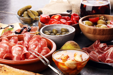 spanish tapas and sangria on wooden table - mediterran antipasti set