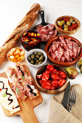 spanish tapas and sangria on wooden table - mediterran antipasti