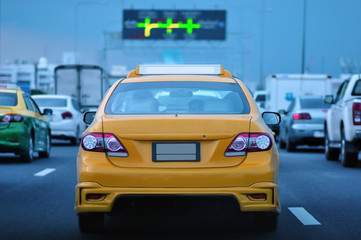 Fototapeta na wymiar Yellow mustard taxi service