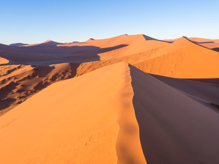 Naklejka na ściany i meble Sunrise at Dune 45 in Namib Desert, Namibia.