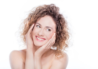 Young smiling woman with curly hair portrait on white