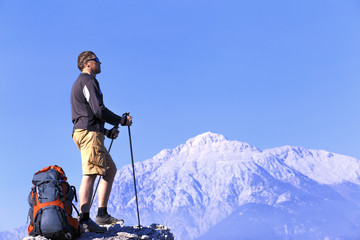 Hiking in the mountains in the summer on a sunny day.