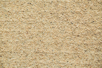 Seamless beach sand surface texture.