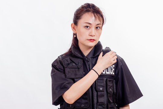 Chinese female police officer on radio