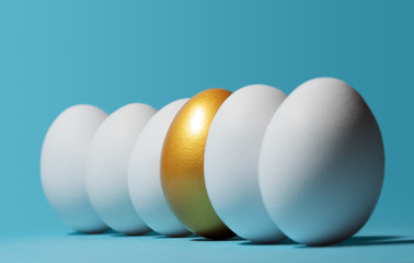 Concept of individuality, exclusivity, better choice. One golden egg among white eggs on blue...