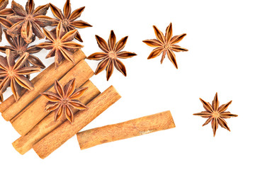 Star anise and cinnamon sticks herb isolates on white back ground